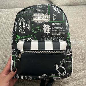 Black and white beetle juice backpack